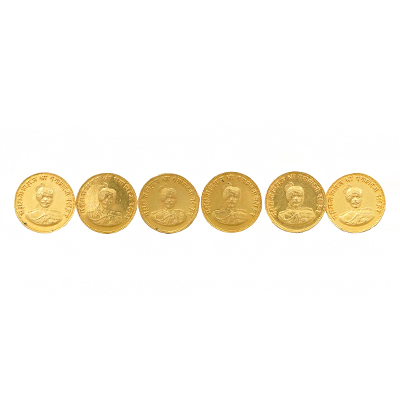 A set of six Gold Buttons 
